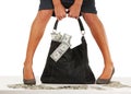 Can you carry your financial burdens. A cropped shot of a woman trying to lift a bag full of money. Royalty Free Stock Photo