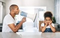 Can you hear me now. a young father reprimanding a child at home. Royalty Free Stock Photo