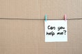 Can you help me? Note is written on a white sticker that hangs w Royalty Free Stock Photo