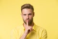 Can you keep secret. Handsome man keep index finger by his lips. Be silent. Secret story concept. Guy confident face Royalty Free Stock Photo