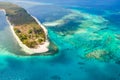 Canabungan Island with sandy beach. Tropical island with white beach on the large atoll, aerial view