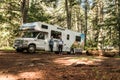 Canada Algonquin National Park 30.09.2017 couple in front of Parked RV camper Lake two rivers Campground Cruise America Royalty Free Stock Photo