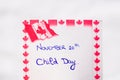 Canada Child Day handwriting on paper with Canada flag. Writing text on memo post reminder. Bucharest, Romania, 2020 Royalty Free Stock Photo