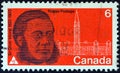 CANADA - CIRCA 1970: A stamp printed in Canada shows statesman Sir Oliver Mowat and Parliament, circa 1970.