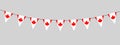 Canada Day decoration, flag of Canada, bunting garland, string of triangular flags for outdoor party, red maple leaf Royalty Free Stock Photo