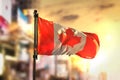 Canada Flag Against City Blurred Background At Sunrise Backlight Royalty Free Stock Photo