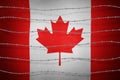Canada flag and barbed wire Royalty Free Stock Photo