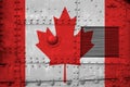 Canada flag depicted on side part of military armored tank closeup. Army forces conceptual background Royalty Free Stock Photo