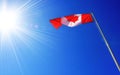 Canadian Flag blue sky Royalty Free Stock Photo