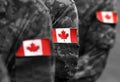 Canada patch flags on soldiers arm. Canadian troops Royalty Free Stock Photo