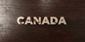Canada - grungy wooden headline on Maple - 3D rendered royalty free stock image