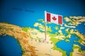 Canada marked with a flag on the map Royalty Free Stock Photo