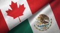 Canada and Mexico two flags textile cloth, fabric texture Royalty Free Stock Photo