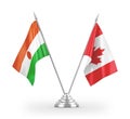 Canada and Niger table flags isolated on white 3D rendering