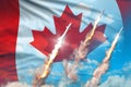 Canada nuclear warhead launch - modern strategic nuclear rocket weapons concept on blue sky background, military industrial 3D