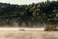 Canada Ontario Lake of two rivers Canoe Canoes foggy water sunrise fog golden hour on water in Algonquin National Park Royalty Free Stock Photo