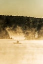 Canada Ontario Lake of two rivers Canoe Canoes foggy water sunrise fog golden hour on water in Algonquin National Park