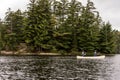 Canada Ontario Lake of two rivers Couple on a Canoe Canoes on the water Algonquin National Park Royalty Free Stock Photo