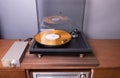 CANADA, Ontario - Nov 09, 2019: Vintage Stereo Turntable Plays Yellow Vinyl Record Album Royalty Free Stock Photo