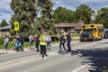 School crossing guard helps children to cross the street.