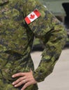 Canada patch flag on soldiers arm Royalty Free Stock Photo