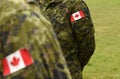 Canada patch flags on soldiers arm. Canadian troops Royalty Free Stock Photo