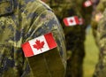 Canada patch flags on soldiers arm. Canadian troops Royalty Free Stock Photo