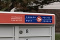 Canada Post Postes Canada box. Canada Post is a Crown corporation that functions as the primary mail operator in Canada Royalty Free Stock Photo