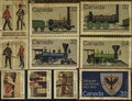 Canada post vintage stamps series of trains Christmas Regiments and school Royalty Free Stock Photo