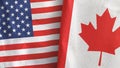 Canada and United States two flags textile cloth 3D rendering Royalty Free Stock Photo