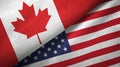 Canada and United States two flags textile cloth, fabric texture Royalty Free Stock Photo