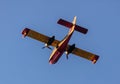 Canadair flight, Firefight Aircraft, scooper flying on blue sky, under view