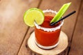 Canadian Caesar drink. Made with vodka, hot sauce and Worcestershire sauce, served with ice in a celery glass with a salted rim,