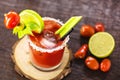 Canadian Caesar drink. Made with vodka, hot sauce and Worcestershire sauce, served with ice in a celery glass with a salted rim,