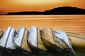 Canadian canoes at sunset Royalty Free Stock Photo