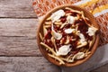 Canadian cuisine: poutine with sauce and cheese. horizontal top