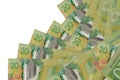 20 Canadian dollars bills lies in different order isolated on white. Local banking or money making concept