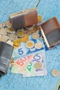 Canadian dollars, coins and wallets on the wooden background Royalty Free Stock Photo