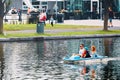 Canadian family cruising on a pedalo boat on the pond in old port, Montreal, Quebec, Canada Royalty Free Stock Photo
