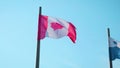 Canadian Flag or the Flag of Canada waving on a windy day. Red and White, the colors of the Maple Leaf