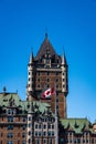 Canadian flag flying in front of the Chateau Frontenac in Quebec City. Royalty Free Stock Photo