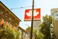 Canadian flag in front of view of False Creek and the Burrard street bridge in Vancouver, Canada Royalty Free Stock Photo