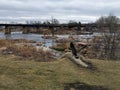 Canadian Geese in front of the Big Sioux River in Sioux Falls, South Dakota with views of wildlife, ruins, park paths, train track Royalty Free Stock Photo