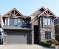 Canadian House Design Home Exterior Black Front View Siding Royalty Free Stock Photo