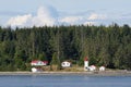 Canadian lighthouse and buildings on Inside Passage cruise.