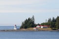 Canadian lighthouse and buildings on Inside Passage cruise.