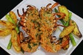 Canadian maine lobster thermidor with black background Royalty Free Stock Photo