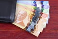 Canadian money in the black wallet Royalty Free Stock Photo