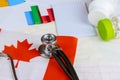 Canadian National flag on stethoscope conceptual series - Canada