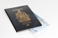 Canadian passport with 20 Euros banknote Royalty Free Stock Photo